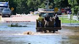 Midwest flooding collapses a rail bridge, forces evacuations and kills at least 1