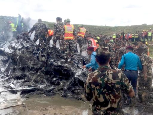 Plane crash kills 18 as aircraft slips off runway while attempting take-off at Nepal airport