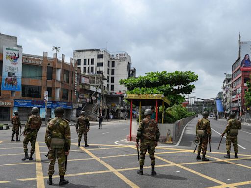 Bangladesh imposes curfew, calls in military as unrest continues