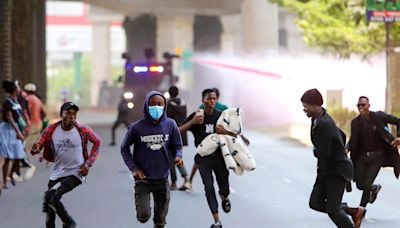 Police in Kenya fire tear gas at protesters as new Cabinet ministers are sworn in