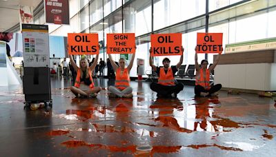 ‘Just the start’: Airports crack down on climate protesters as summer of disruption begins