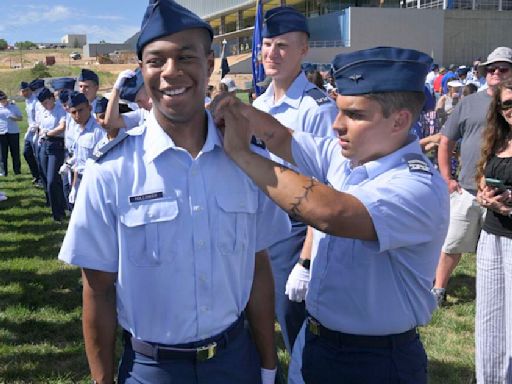 Freshmen cadets at the Air Force Academy celebrate completion of basic training