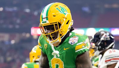 Oregon Football’s Bucky Irving Embraces Role with 'Run Heavy' Buccaneers