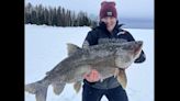 Angler pulls 57-pound lake trout through the ice; ‘I was frozen’