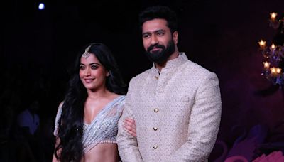 Vicky Kaushal and Rashmika Mandanna Blow Kisses, Hold Hands As They Walk The Ramp | Watch - News18