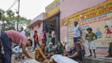 Outside Hathras hospital, bodies of stampede victims lay on the floor, loud wails pierce the air