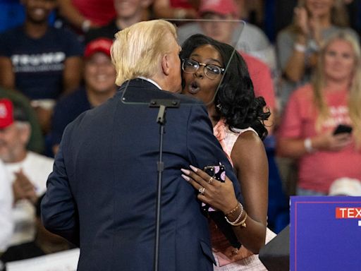 Trump embraces MAGA activist at Atlanta rally who repeats his offensive claims about Harris’ heritage