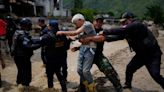 Deadly floodwaters rage through the Venezuelan city of Maracay