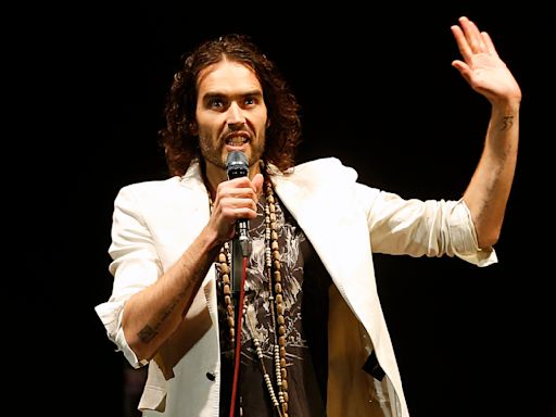 Russell Brand says Bear Grylls 'flanked' him as he was baptised in Thames