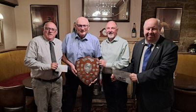 Rotary Club of Oldham present Community Service Shield to Latics saviour Frank