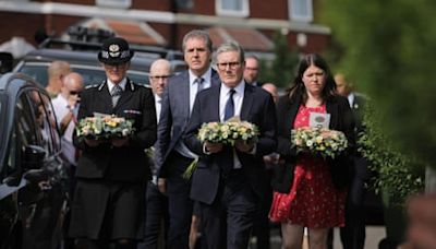 Southport stabbing latest: hundreds gather for vigil as police name three young girls killed in attack