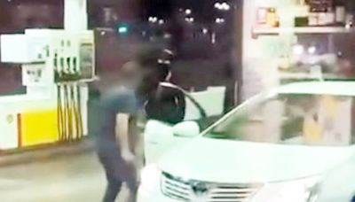 Watch: Terrifying moment driver is targeted by machete gang at petrol station