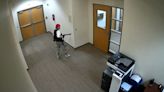 Chilling CCTV shows Nashville school shooter roaming corridors armed with assault rifle