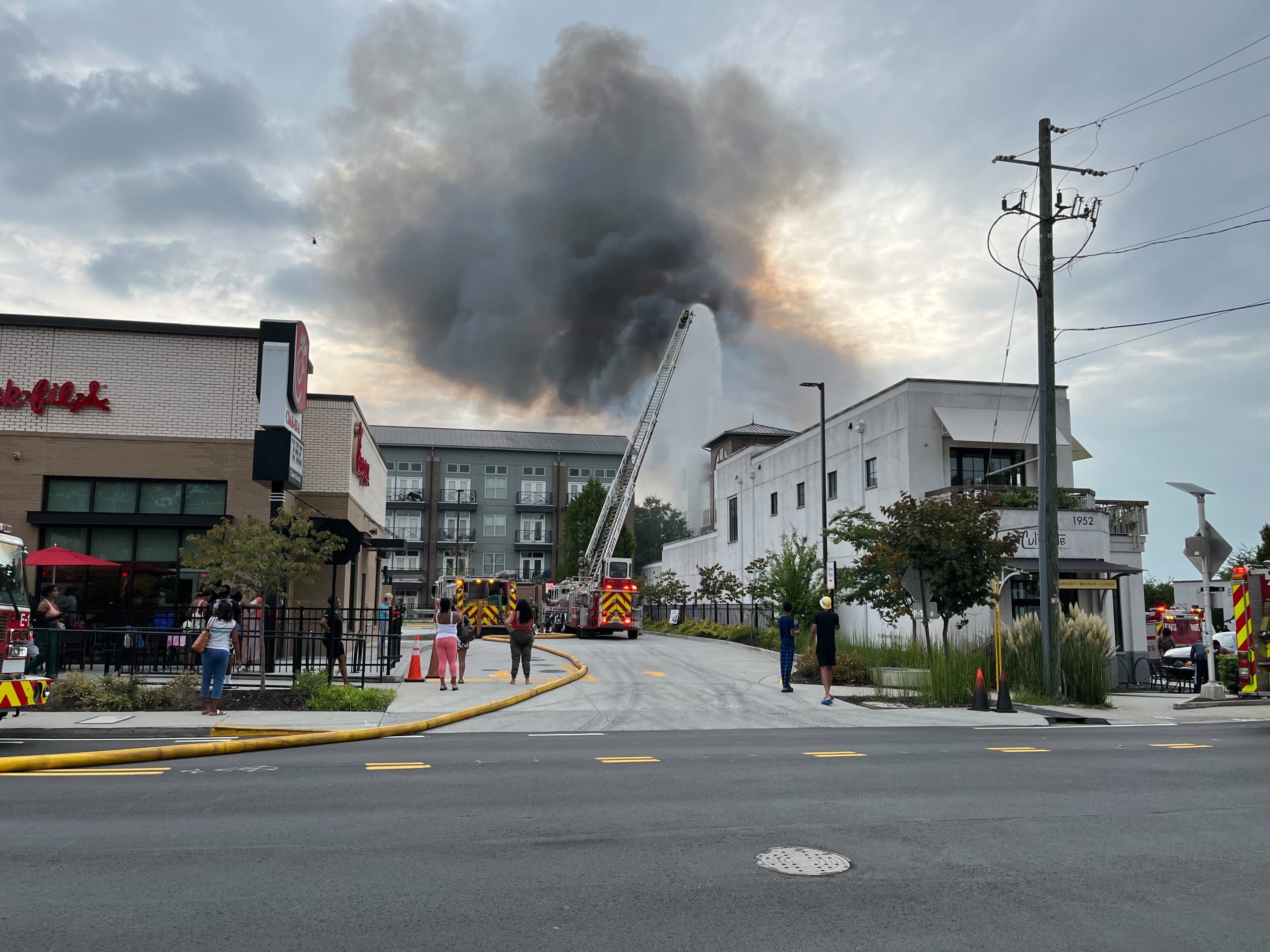 Dozens displaced by fire at luxury apartments behind Atlanta Chick-fil-A, multiple floors collapse