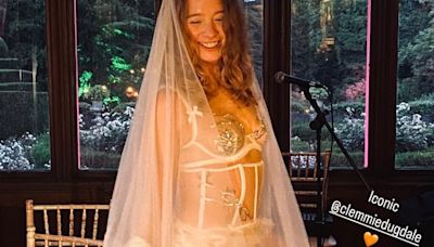 Aristocrat Clemmie Dugdale strips down to her lingerie at her wedding