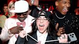 Flavor Flav Gifts Billie Eilish a Custom, Barbie-Themed Clock Necklace at 2024 Vanity Fair Oscars Party