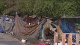 East Bay Tire Company sued over loud music blasted at homeless encampment