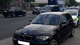 Police stop BMW with front end damage and discover driver is uninsured