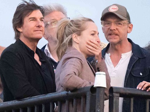 Tom Cruise Attends Coldplay’s Glastonbury Festival Set with Gillian Anderson and Simon Pegg