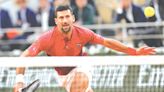 Novak Djokovic sets Grand Slam tennis record but may be out of French Open with injury