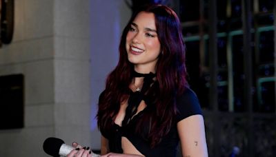 Dua Lipa Wore Laced-Up Fishnet Pants For Her 'SNL' Hosting Debut