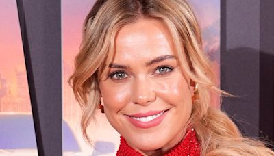 TOWIE's Chloe Meadows puts on a daring display in a racy red gown