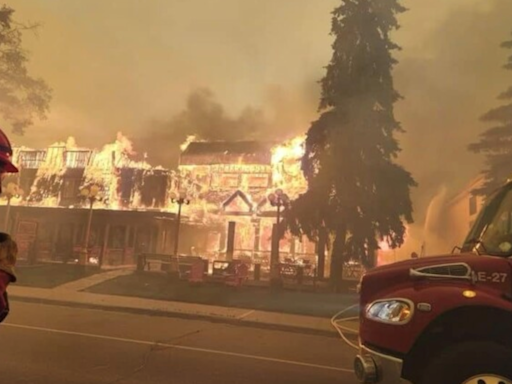Beyond Local: Out-of-control wildfire reaches Jasper townsite, burning buildings