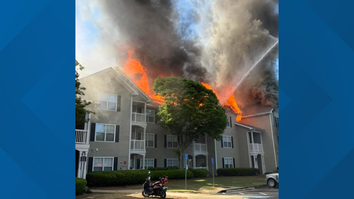 Firefighters battle flames at Woodstock apartment complex