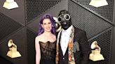 Who is the man in the mask at the Grammys with Kelly Osbourne?