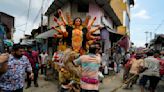 AP PHOTOS: Kolkata artists paint, mold idols for Durga Puja