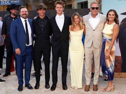 Kevin Costner, 69, poses with FIVE of his children