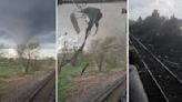 Incredible Footage: Train Conductor Finds Himself Caught In Tornado's Path