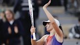 Swiatek pleads for peace from the fans after edging past Osaka at French Open