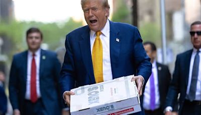 Donald Trump delivers pizza to New York City firefighters in post-court campaign stop