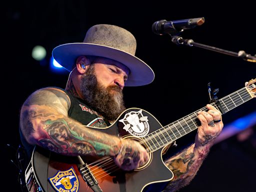 Hear Zac Brown’s Heartfelt Adios to Jimmy Buffett ‘Pirates & Parrots’