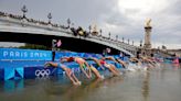 Olympics-Triathlon-France's Beaugrand wins gold after Seine passes water quality tests