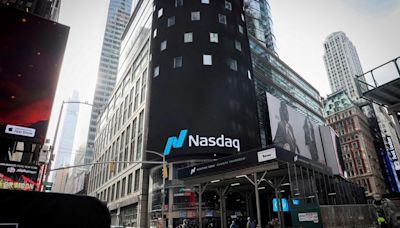 Nasdaq, S&P 500 end sharply lower, hit by chips, megacaps; Dow extends rally