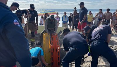 Teen girl rescued after getting trapped in sand hole at San Diego beach