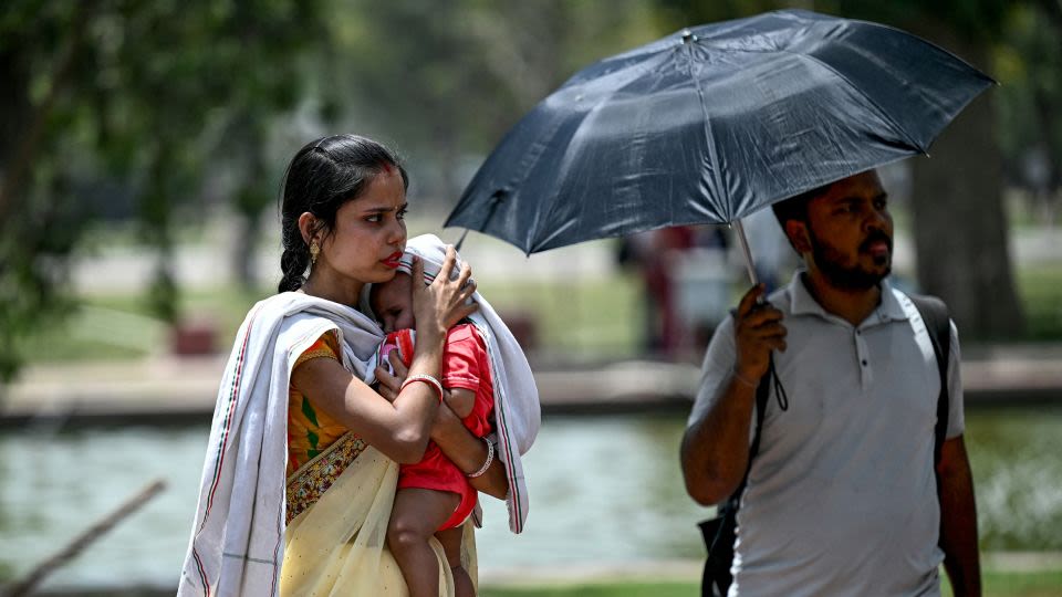 Indian capital of Delhi breaks all-time heat record, as authorities impose water rationing