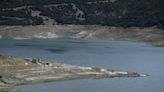 Ruins of a long-sunken Greek village emerge as drought saps a vital reservoir