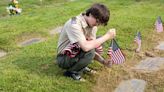 Scouts help decorate cemeteries for Memorial Day