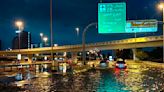 Dubai flooding hobbles major airport's operations as "historic weather event" brings torrential rains to UAE