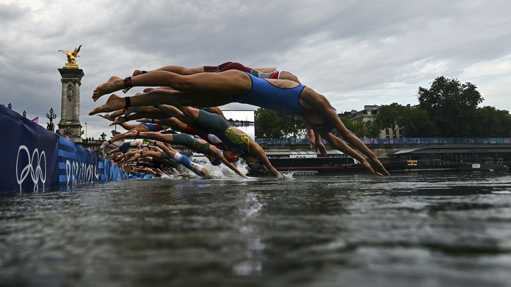 Olympic marathon swimmers train in Seine River after green light on water safety