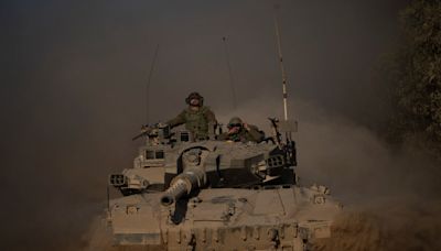 Israeli tanks roll deeper into Gaza City as residents flee