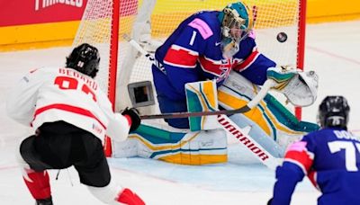 Connor Bedard scores pair in hockey worlds debut to lead Canada past Great Britain | CBC Sports