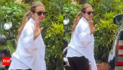Far from breakup rumours with Arjun Kapoor, Malaika Arora flaunts fitness and style in chic city outing - video inside | Hindi Movie News - Times of India