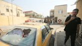 Clashes in Iraq's Basra kill four as crisis flares in oil-rich south