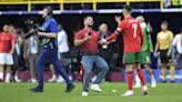 Portugal boss Roberto Martinez voices worry over pitch invaders seeking selfies