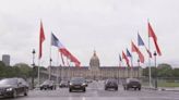 Chinese, French national flags flying in Paris for Xi's visit