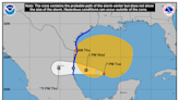 Threat lessens for disturbance near Florida. Texas gears up for heavy tropical rains